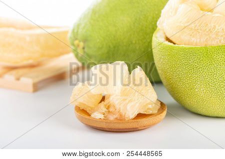 Fresh And Peeled Pomelo(shaddock), Grapefruit With Slices Isolated On White Background