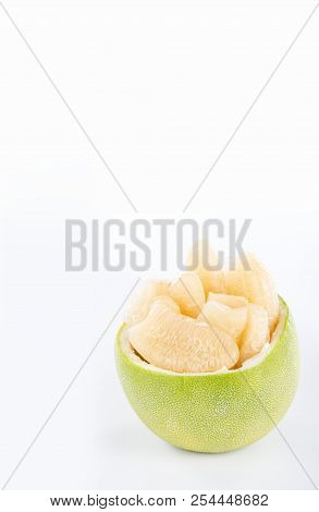 Fresh And Peeled Pomelo(shaddock), Grapefruit With Slices Isolated On White Background