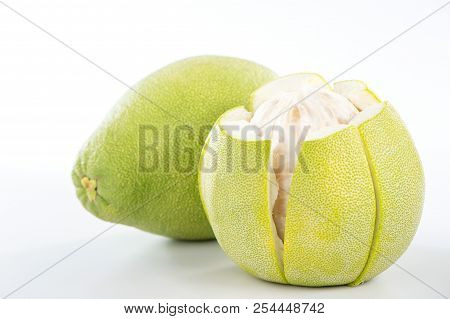 Fresh And Peeled Pomelo(shaddock), Grapefruit With Slices Isolated On White Background