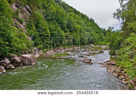 Landscape With A Picturesque Waterfall On The River Prut In The Ukrainian Carpathians