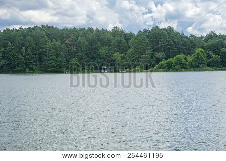 Zhytomyr, Ukraine - July 16, 2018. Athletes Conduct Training On High-speed Swimming Kayak (kayaking)