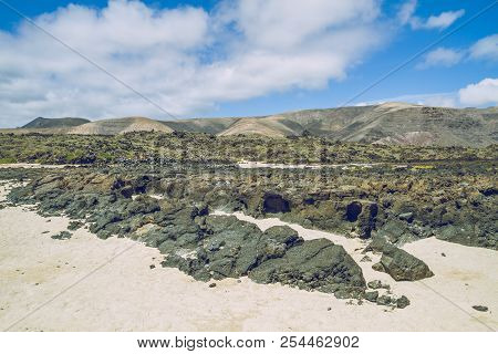 Lanzerote Beach With Vulcano Rocks.