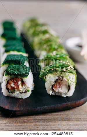 Tasty Appetizing Sushi Roll With Tuna, Covered With Calf Caviar And Chuka Seaweed. Restaurant Menu, 