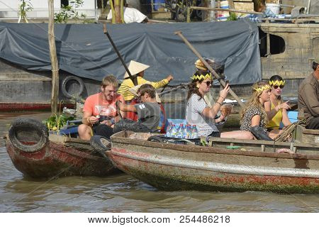 Phong Dien, Vietnam - December 31st 2017. Tourist On A Boat Tour At The Phong Dien Floating Market N