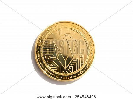 On A White Background Is Isolated Gold Coin Of A Digital Crypto  Currency - Eos With Free Space For 