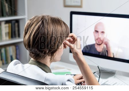 Digital Health Concept: Practicing Physician Having Online Appointment With A Patient. Medical Docto