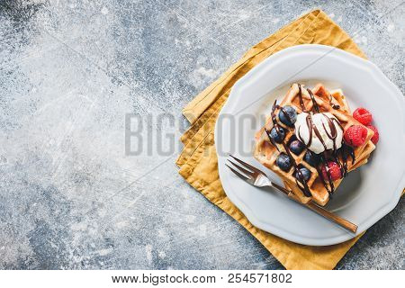Belgian Waffles With Berries And Ice Cream, Top View And Copy Space For Text. Sweet Breakfast Concep