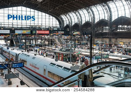 Hamburg, Germany - August, 2018: Trains And Passengers At Main Railway Station In Hamburg