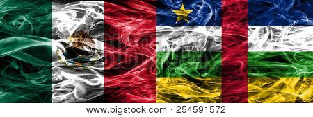 Mexico Vs Central African Republic Smoke Flags Placed Side By Side. Mexican And Central African Repu