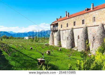 Alaverdi Orthodox Monastery In Kakheti Region In Georgia And Snow Peaks Of Caucasus Mountains
