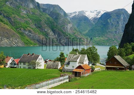 Undredal, Norway - June 07, 2010: View To The Small Village At The Bank Of The Aurland Fjord In Undr
