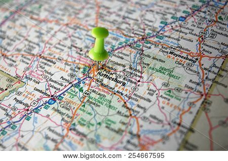 A Map Of Hattiesburg, Mississippi Marked With A Push Pin.