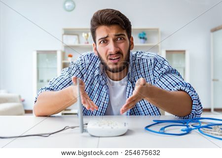 Frustrated young man due to weak internet reception