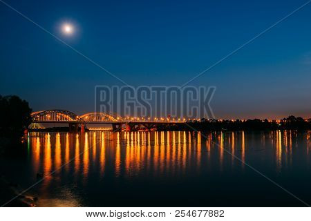 Darnitskiy Bridge Across Dnepr River At Night. Kiev, Ukraine