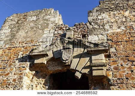 Detail Of The Ruined Pediment And Coat Of Arms Above The Portal At The Entrance Of The Palace Of Chr