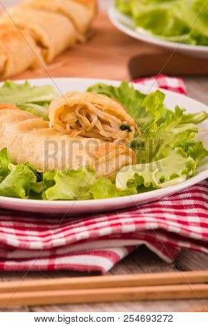 Spring Rolls With Soja Dip On White Dish.
