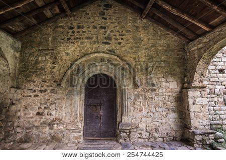 Ancient Wooden Door Of Sant Feliu Church In Barruera, Catalonia, Spain.