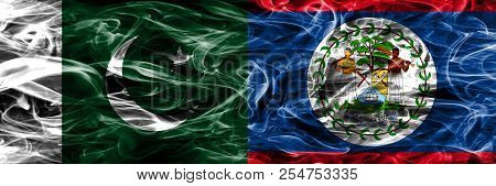 Pakistan Vs Belize Smoke Flags Placed Side By Side. Thick Colored Silky Smoke Flags Of Pakistan And 