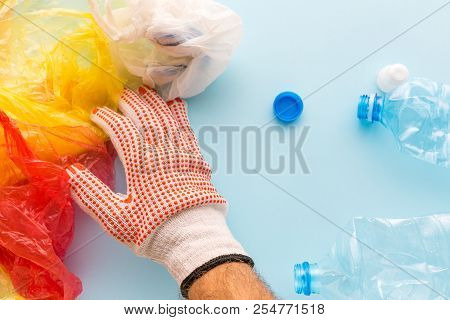 Worker Sorting Plastic Garbage For Recycling, Conceptual Image