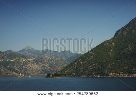 Boko-kotorska Bay In Montenegro. Epic View Of The Island Of Saint George Island And The Roman Cathol
