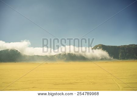 Cloud Eating Mountain And Moving Forward To Eat Desert Also