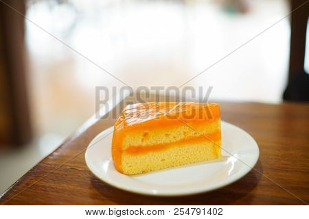 A Piece Of Orange Cake. Like Our Life Sometimes Look Seem Hard To Stay But Actually Easy Like A Piec