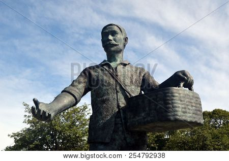 Peasant monument. Typical small town in Southern Norway. June 19,2018. Rakkestad, Ostfold Region. Norway