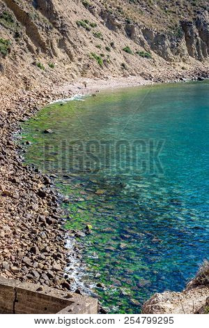 Jebha Island And Waves And Rocks