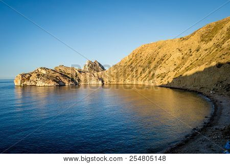 Jebha Island And Waves And Rocks
