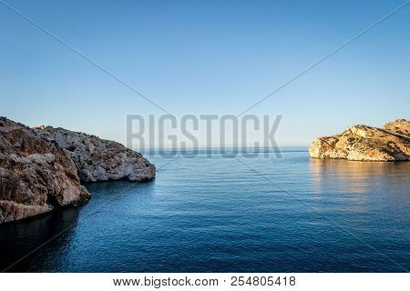 Jebha Island And Waves And Rocks