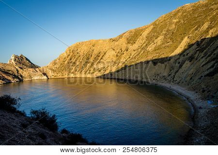 Jebha Island And Waves And Rocks