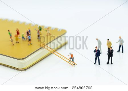 Miniature People: Child Support And Scholarships For Underprivileged Children. Image Use For Educati