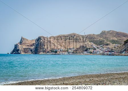 Jebha Island And Waves And Rocks