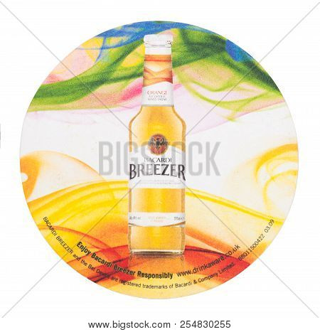 London, Uk - August 22, 2018: Bacardi Breezer Mix Cocktail Rum Paper Mat Coaster Isolated On White B