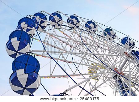Ferris wheel in evening park