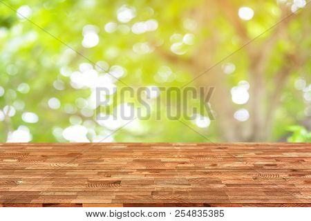 Emtry Wooden Table On Top Over Blur Natural Background, Can Be Used Mock Up For Montage Products Dis