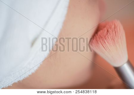 Pretty Girl Is Applying Blush On Cheek By Brush. Beauty Makeup.