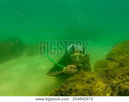Diving Hobbie In Houcima Bay In Summer