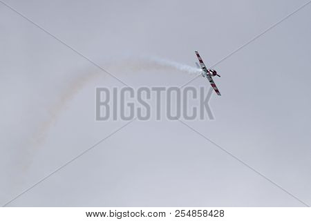 Novosibirsk, Russia - August 5, 2018: Long Angle View Of Yak-52 Aircraft Performs A Program At The A
