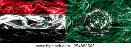 Syria Vs Arab League Smoke Flags Placed Side By Side. Thick Colored Silky Smoke Flags Of Syrian And 