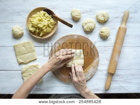 Cooking Traditional Pies With Potatoes. Placinta -traditional Homemade Romanian And Moldovan Pies.