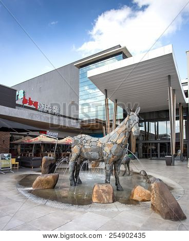 Johannesburg, South Africa, 18 August - 2018: Entrance To Mall With Sculpture Of Animals In Foregrou