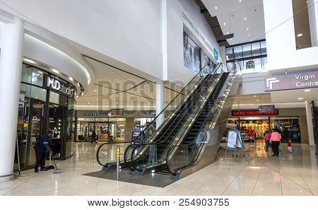 Johannesburg, South Africa, 19 August - 2018: Interior To Mall With Escalator To Upper Level.