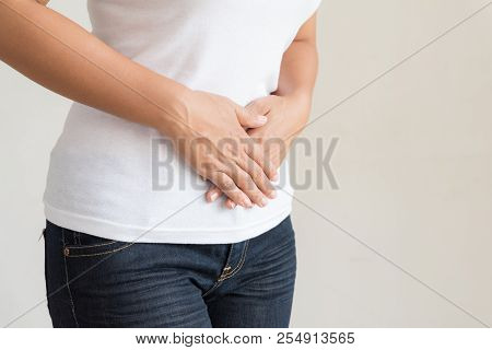 Young Woman Having Painful Stomachache. Chronic Gastritis. Abdomen Bloating Concept.
