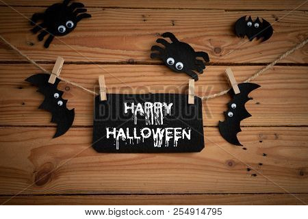 Halloween Crafts, Bat, Spide And Cobweb On Wooden Table Background With Happy Halloween Text. Hallow
