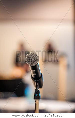 Portrait Of A Microphone In A Conference Room.