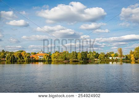 Panoramic View Of Amazing Landscape With A Lake And Blue Sky With White Clouds. Salt Lake, Sosto, Ny
