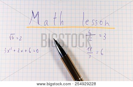 A Title Of Square Paper With Golden Pen. Title Is Math Lesson Because School Is Here. And New Beginn