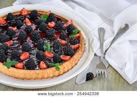 Berry Tart. Sweet Blackberry Strawberry Tart, Summer Berry Pie On A Wooden Table.