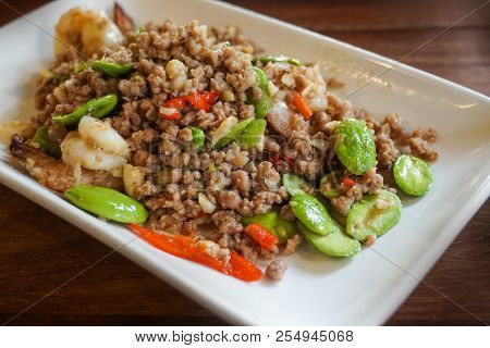 stir-fried twisted cluster bitter bean with shrimp thai traditional food